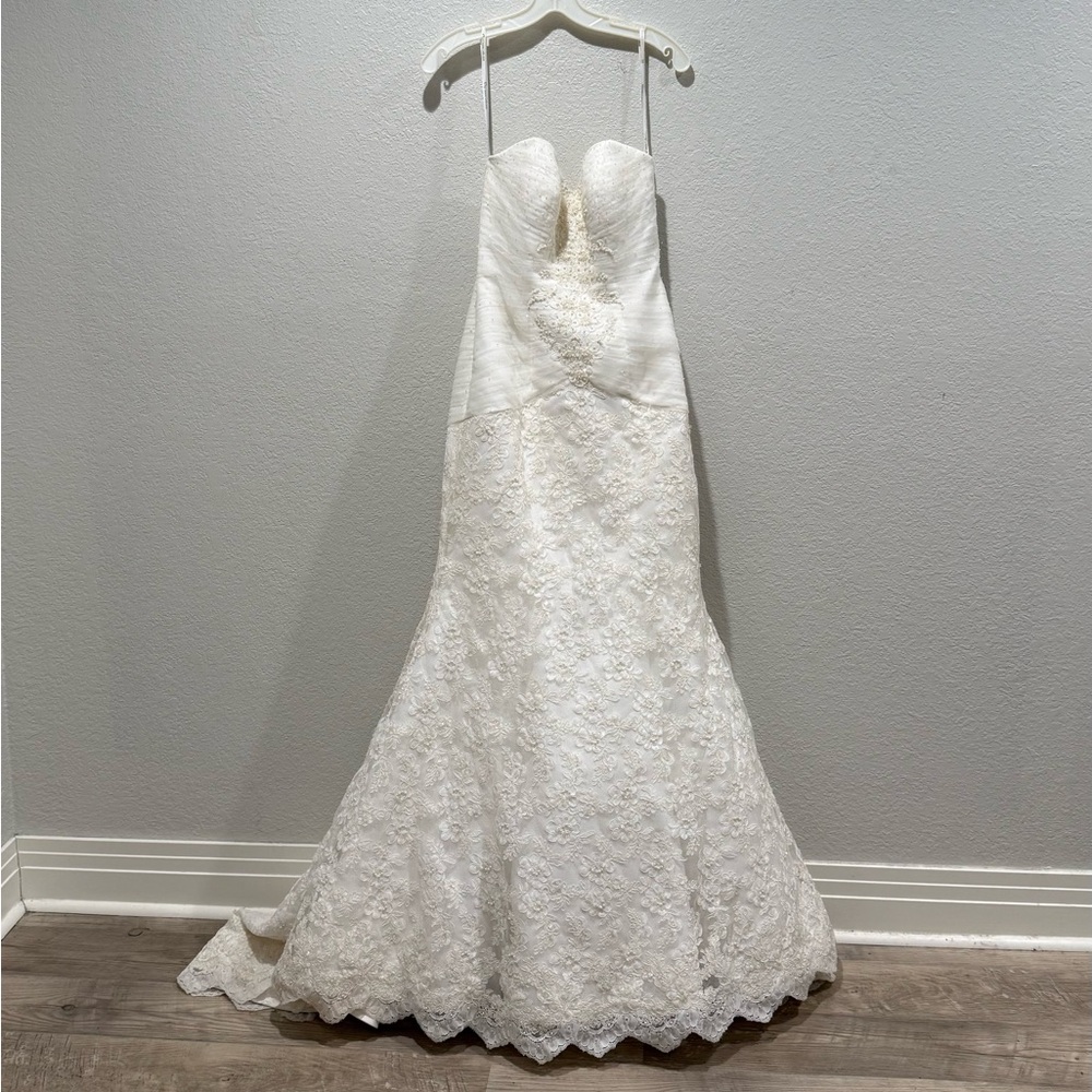 Ivory Oleg Cassini wedding dress